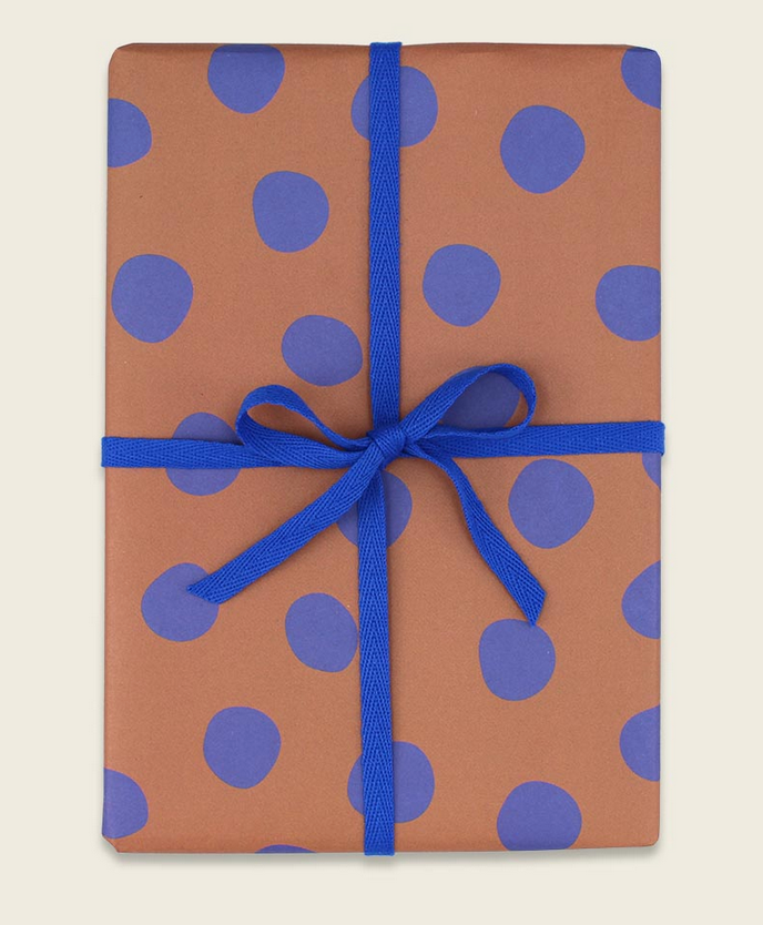 Geschenkpapier rost mit blauen Punkten