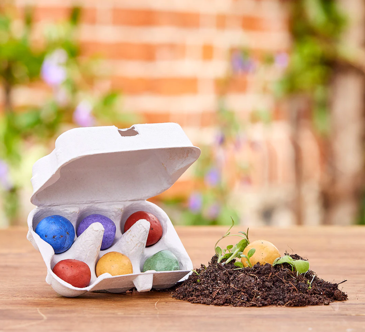 6 bunte Blumenmurmeln im Eierkarton