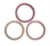 Beißring Perlen Mushie Rosa